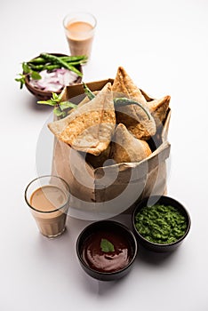 SamosaÂ Snack is an Indian deep fried pastry with a spiced filling usually made with potatoes, spices and herb